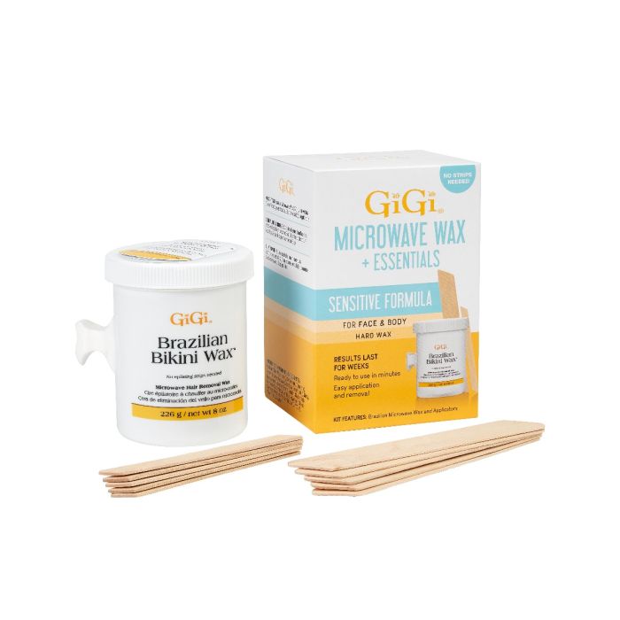 GiGi Sensitive Formula Brazilian Bikini Microwave Wax & Essentials box alongside contents of wax & sets of applicators